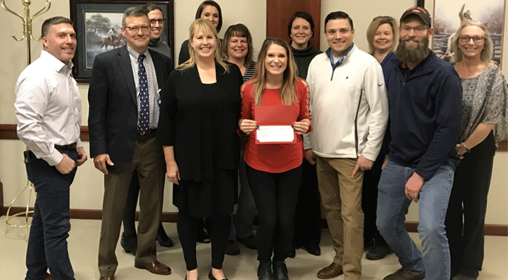 Members of the Union Pacific Railroad Foundation present Mid-Plains United Way Executive Director Alisha Forbes and board members with a check for $10,000.