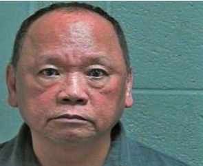 Kan. high court may decide if prison dentist's touching was lewd