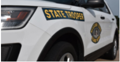 Dearborn woman hospitalized after car overturns