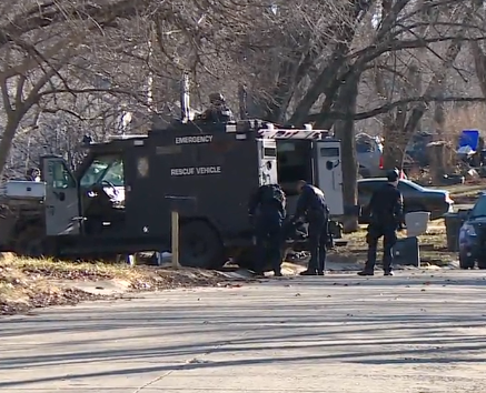 Police on the scene of the standoff Wednesday photo courtesy WIBW TV