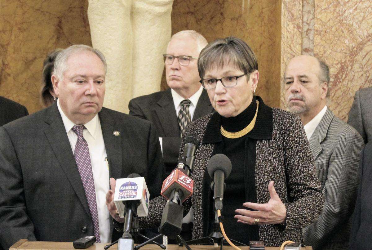 Gov. Laura Kelly and Senate Majority Leader Jim Denning announcing a Medicaid expansion compromise on Thursday.&nbsp;Credit Stephen Koranda / Kansas News Service