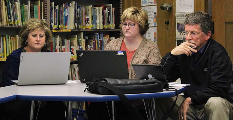 From left: Lori Hertel, Tammy Wellbrock and Craig Pallister took their seats on the Hays USD school board on Monday. Board member Allen Park, not pictured, is also a new board member.