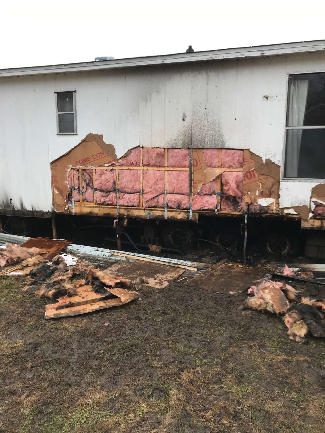 Fire damage to a mobile home trailer in Milford