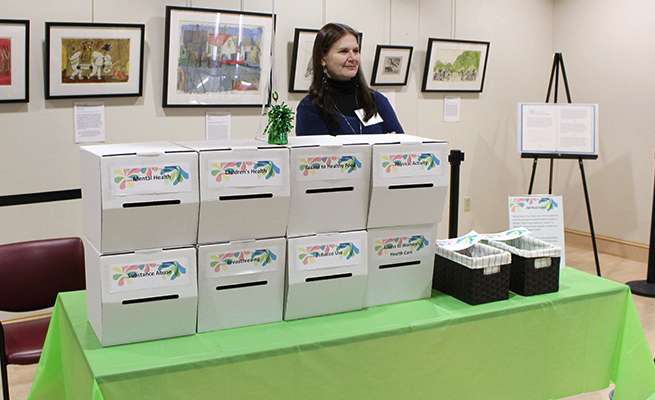 Families were asked to use fake money to budget their dollars on issues that need to be addressed in their communities.