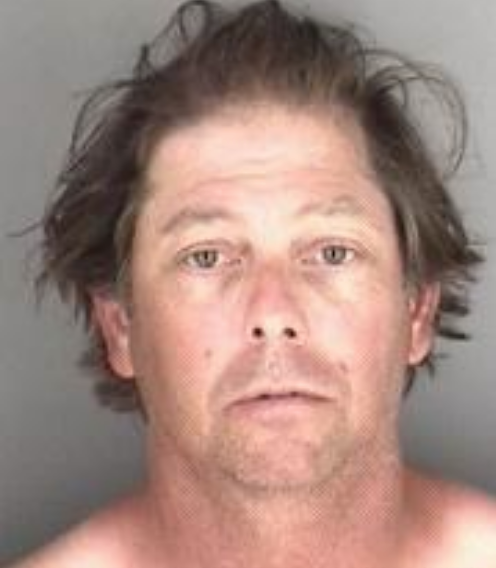 Delbert L. Henson photo from a previous arrest in Shawnee  County