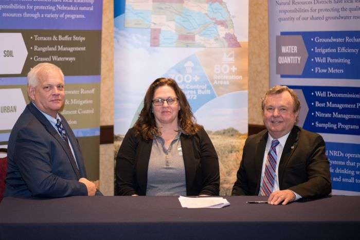 Nebraska’s Natural Resources Districts (NRDs) sign a Memorandum of Agreement with the U.S. Department of Agriculture’s Natural Resources Conservation Service (NRCS) Jan. 28. The agreement is a renewal of a long-standing commitment between the NRDs and NRCS to protect and conserve Nebraska’s natural resources. From left, Upper Big Blue NRD Manager David Eigenberg, Lewis &amp; Clark NRD Manager Annette Sudbeck and NRCS State Conservationist Craig Derickson. (Photo:&nbsp;<b>Sydney Norris, Twin Platte NRD)</b>
