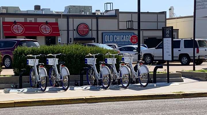 <b>The KANcycle bicycles at the South Seventh Street and West Walnut Street location in downtown Salina.</b> Salina Post photo
