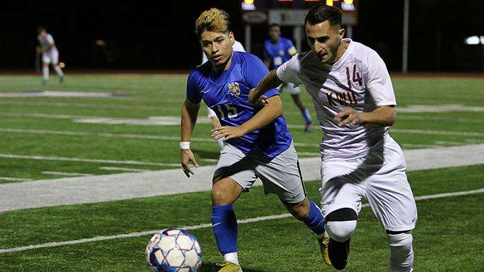 <b>KWU's Artin Almary, right, helped the Coyotes to a win over Bethany Saturday. </b>Photo courtesy <a href="http://kwucoyotes.com">kwucoyotes.com</a>
