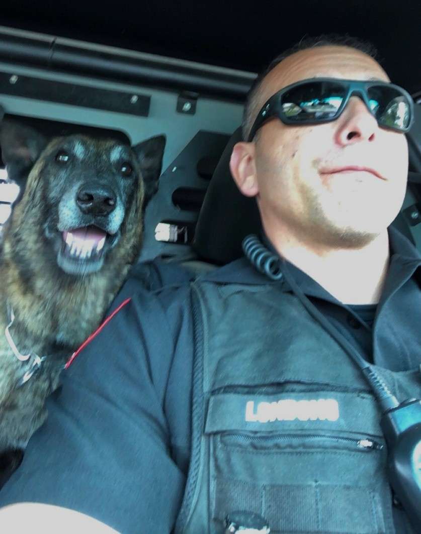 <b>K9 Officer Carlos Londono and Bennie. </b>Photos courtesy <a href="https://www.facebook.com/SalinaKSPD/">Salina Police Department</a> Facebook page