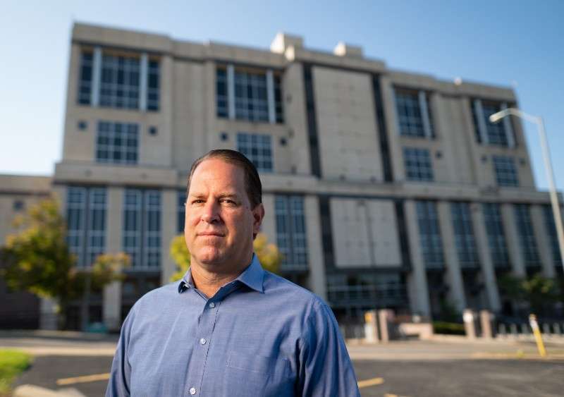 <b>Scott Moore sued former Kansas Secretary of State Kris Kobach, with the help of the American Civil Liberties Union, over the use of a controversial program used by Kobach’s office to look for examples of voter fraud. The program produced false positives more than 99% of the time and was vulnerable to security problems.</b> (Nick Krug for Kansas Reflector)