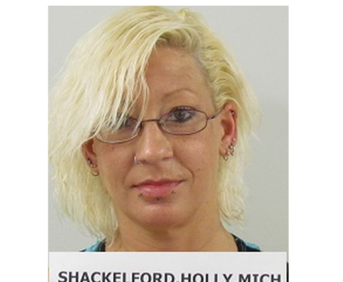 Holly M. Shackelford has a previous drug conviction, according to the Kansas Dept. of Corrections.