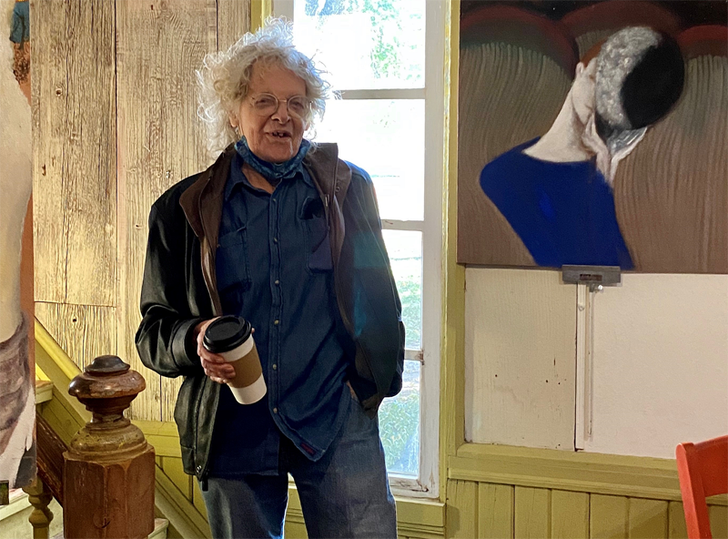 <b>Lindsborg painter Mike Hartung at the Red Barn Studio Museum, where his new work is up through Oct. 24. </b>Photo by Saskia Lehnert courtesy Kansas Reflector