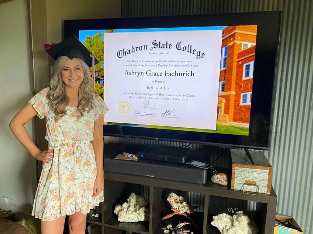 Chadron State College graduate Ashtyn Feahnrich poses with a screen shot of her diploma during CSC's first virtual commencement ceremony May 9, 2020. (Courtesy photo)