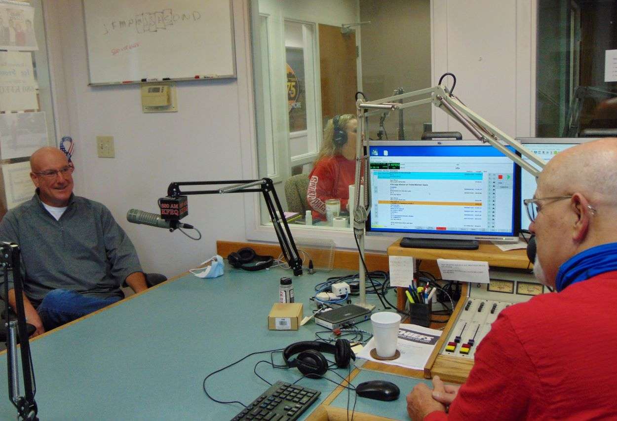 Dean Wilson speaks with host Barry Birr on the KFEQ Hotline/Photo by Brent Martin