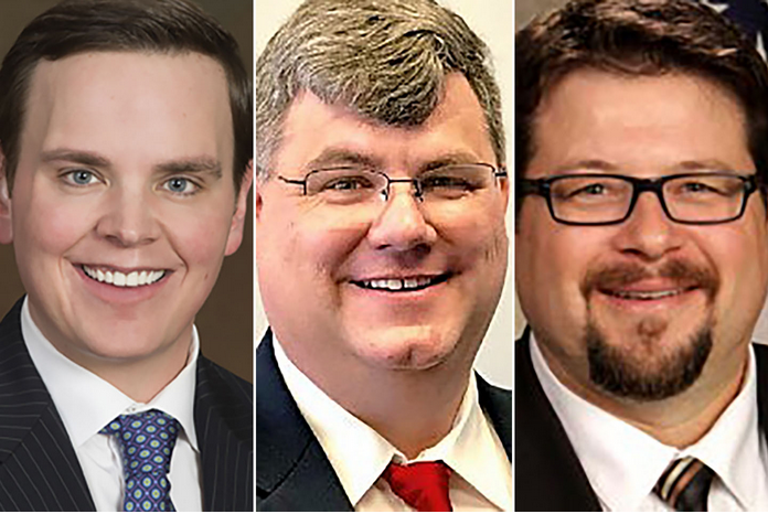 From left: Sedgwick County Commissioner Michael O'Donnell, Kansas House Rep. Michael Capps and Wichita City Councilman James Clendenin. (Sherman Smith/Kansas Reflector)