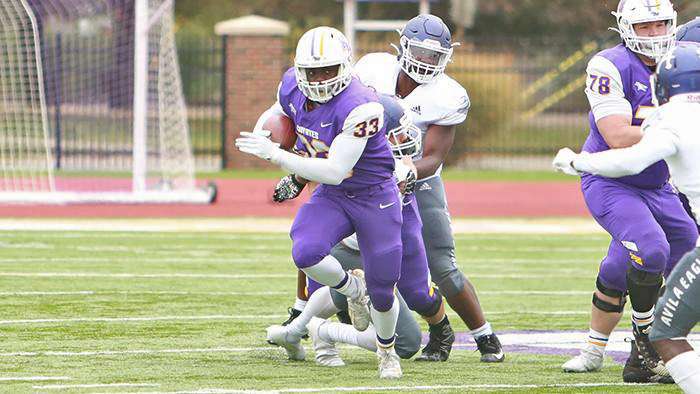 <b>Running back Christopher "C.J." Fluker provided the spark the Coyotes needed.</b> Photo courtesy <a href="http://kwucoyotes.com">kwucoyotes.com</a>