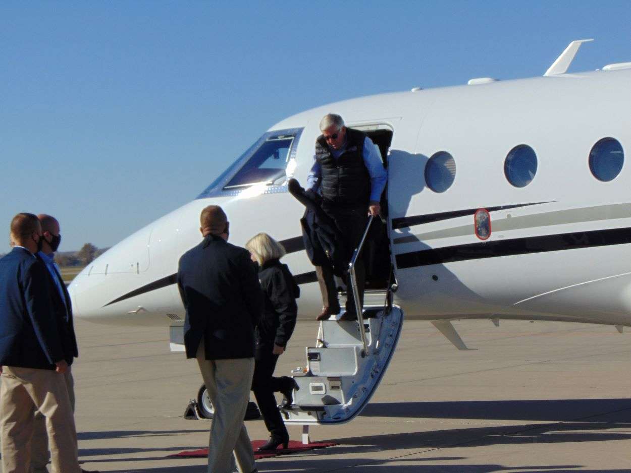 Gov. Mike Parson exits his plane at Rosecrans Memorial Airport/Photo by Brent Martin