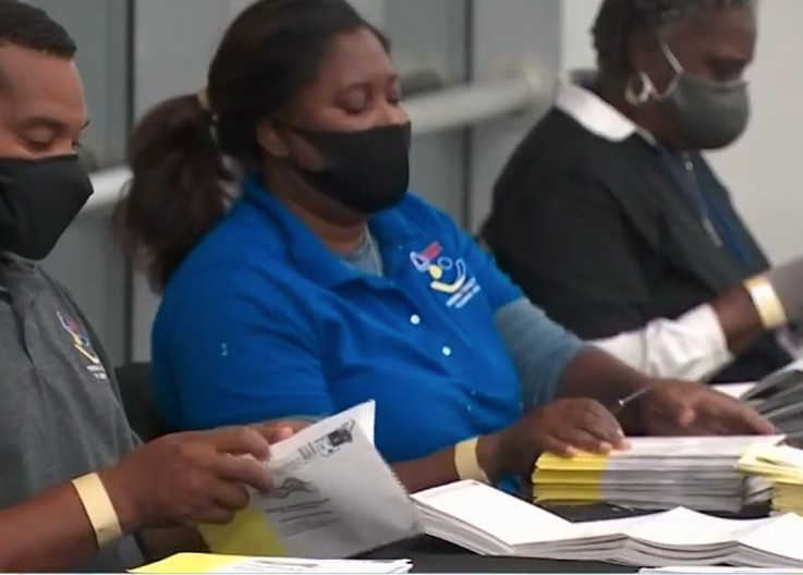Volunteers sorting ballots in Georgia late Thursday -photo Georgia Secretary of State