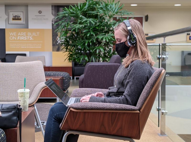 A Wichita State University student sits in the university's student center. Stephan Bisaha / Kansas News Service