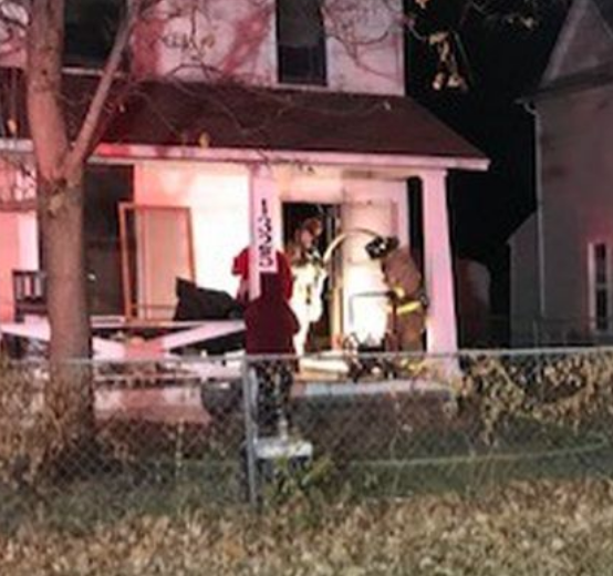 Firefighters on the scene of the house fire Thursday photo courtesy WIBW-TV