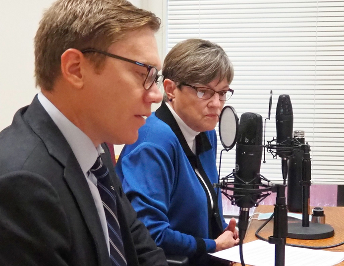 Gov. Laura Kelly and David Toland, secretary of the Kansas Department of Commerce, are working to develop a low-cost alternative to the Main Street program helping to revitalize downtown areas in rural communities. (Sherman Smith/Kansas Reflector)