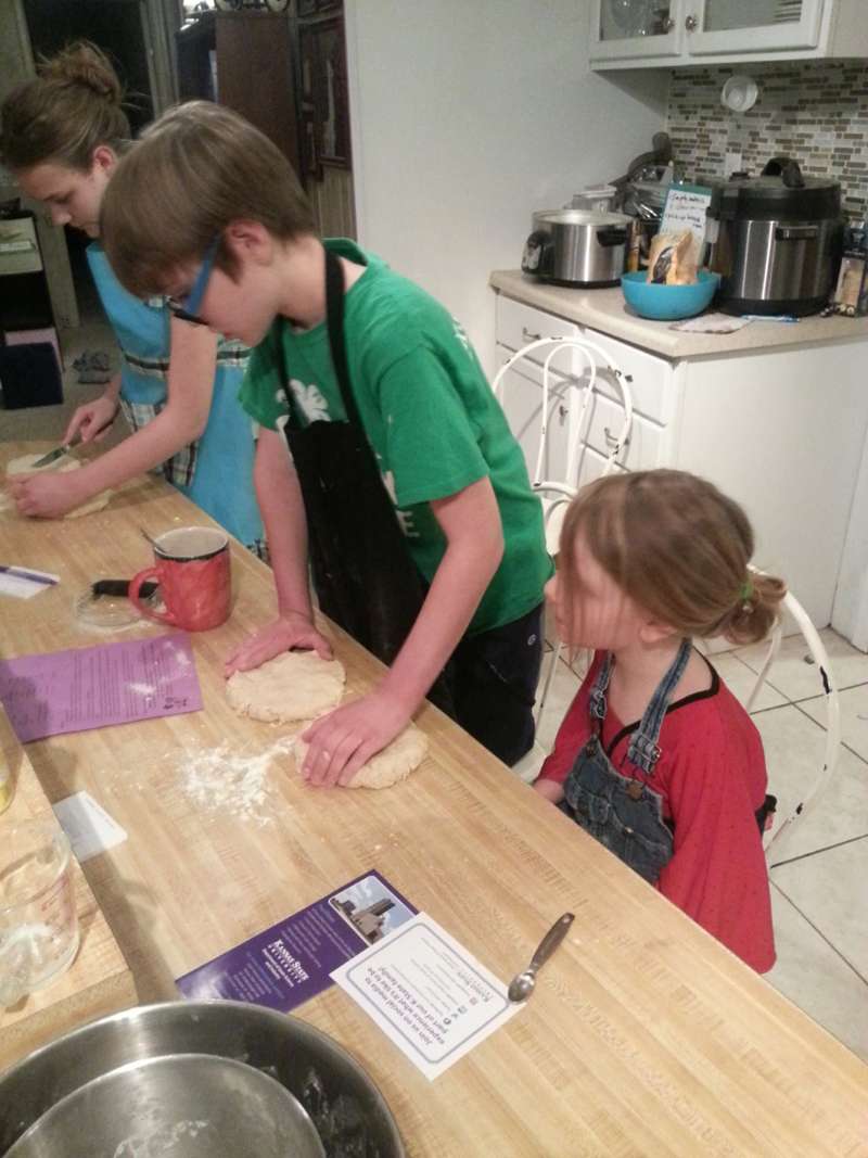 <b>Smoky View 4-H members Acacia, Eian, and Maia Pracht make scones as a part of the project.</b> Photo courtesy Smoky View 4-H Club