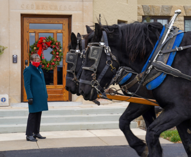 Gov. Laura Kelly wore a mask to welcome the tree and wreath -photos courtesy office of Kansas governor.