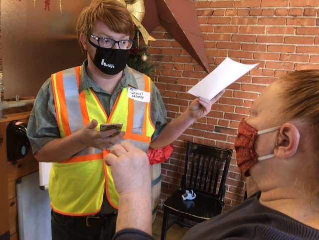 Sam, son of volunteer coordinator Laura Allen, First Call For Help, was in charge of meal deliveries. 