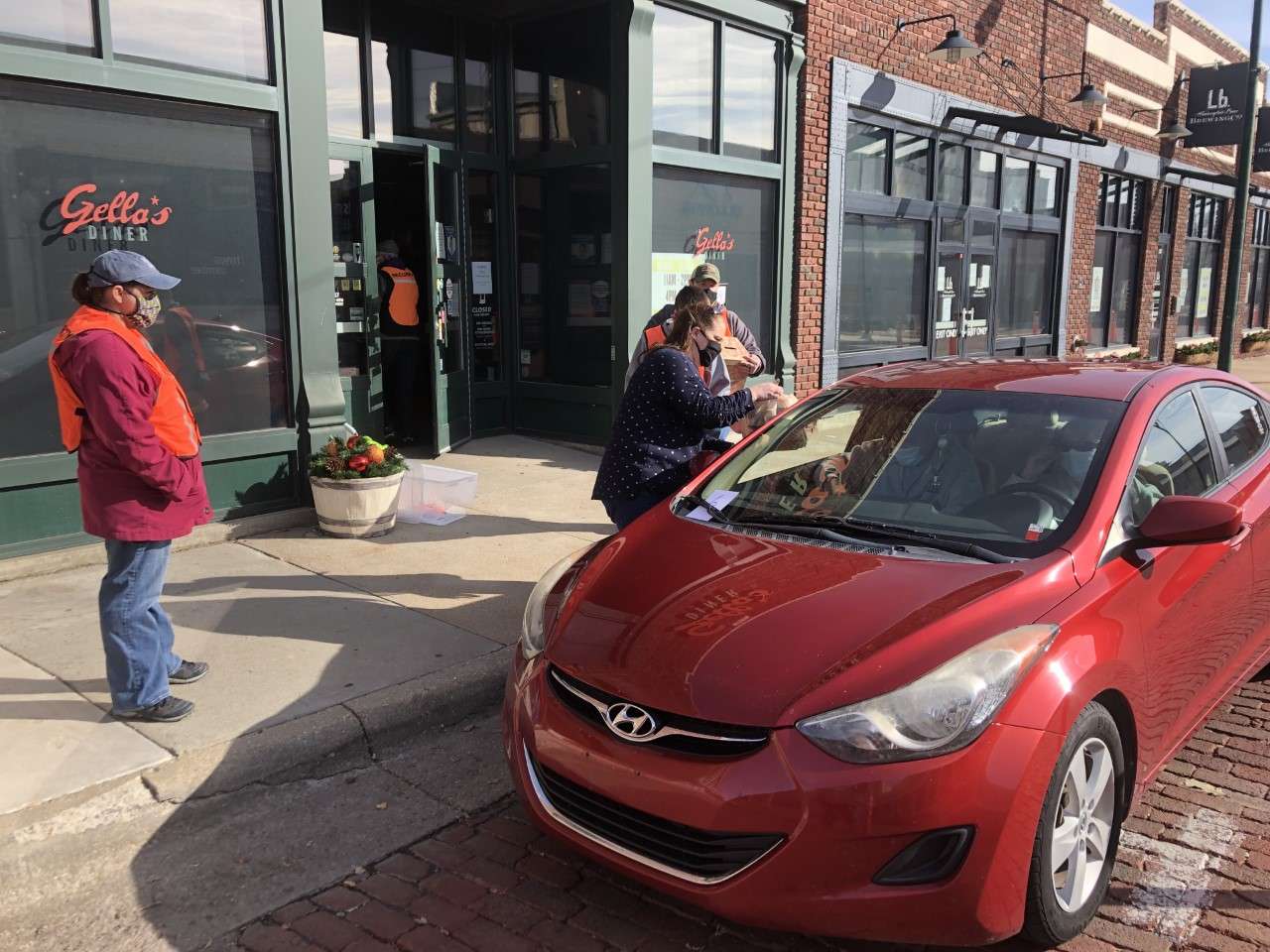 The annual Ellis County Ministerial Alliance Community Thanksgiving Dinner in Hays became a drive-through pick up meal this year because of COVID-19.