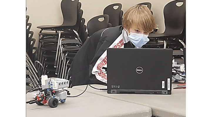 <i>Ryker Olson, of Brule, codes a robot during a LEGO MINDSTORMS class at the MPCC Ogallala Campus.</i>
