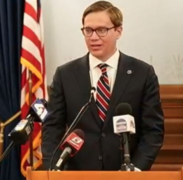 Toland during Monday's Statehouse news conference
