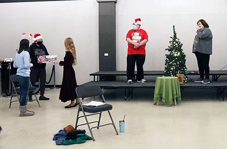 Members of the Hays Community Theatre perform&nbsp;"Put a Little Love in Your Heart" for&nbsp;"We Need a Little Christmas," a national variety show that will be broadcast on YouTube on Thursday.