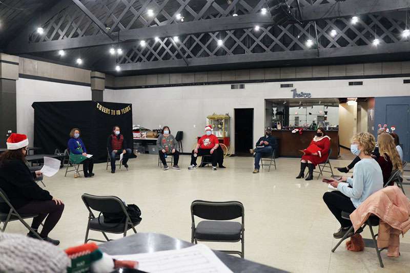 Hays Community Theatre performers rehearse for their performance for the HiGlass Productions presentation of&nbsp;"We Need a Little Christmas."