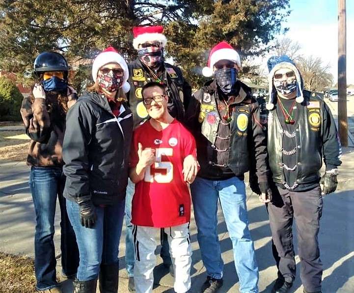 Pictured with Jacob Houghton, with his mother's permission to divulge his name are: Our "elves", left to right:  Caitlin Farrell, Claudine  Richmeir, Ray Palmer, Mark Richmeir and Vince Griego. Not pictured, but are key team members, Angie Rupp and Amber Koshiol. Submitted photo