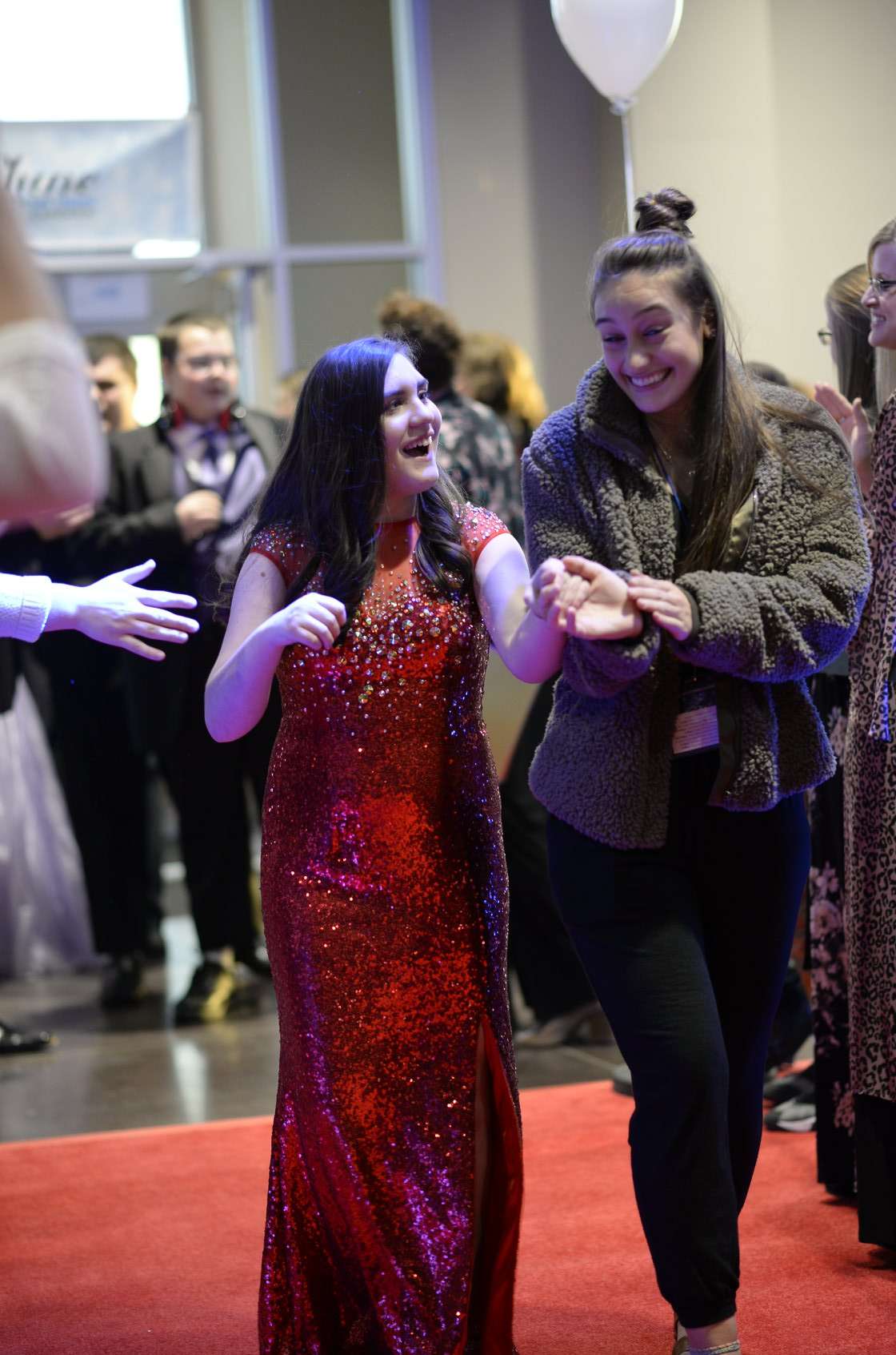 A Night to Shine guest is welcomed to last year's event.