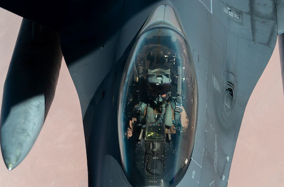 U.S. Air Force F-16 Fighting Falcon is aerial refueled by a KC-135 “Stratotanker” over the U.S. Central Command area of responsibility Dec. 30, 2020 as part of an escort mission in support of the B-52 “Stratofortress” deployment. The short-notice deployment underscores the U.S. military's commitment to regional security and demonstrates a unique ability to rapidly deploy overwhelming combat power on short notice. The B-52H is a long-range, heavy bomber that is capable of flying at high subsonic speeds at altitudes of up to 50,000 feet and provides the United States with immediate global strike capability. (U.S. Air Force photo by Senior Airman Roslyn Ward)