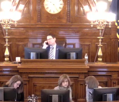 House Speaker Ron Ryckman, (R- Olathe) took numerous phone calls during the Friday morning tense vote count and&nbsp; "Call of the House" that requires representatives stay seated.&nbsp; The voting started&nbsp; at 10:22a.m. and continued into late afternoon.-image courtesy Kansas Legislature YouTube