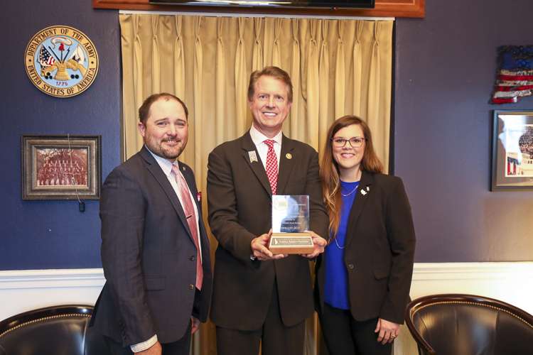 <b>NSP Chairman Dan Atkisson, Stockton</b>, Congressman Roger Marshall (R-KS) and NSP Board Director Amy France, Marienthal
