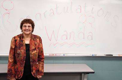 Wanda Hornbacher, of North Platte, is honored for her years of service during a retirement party at North Platte Community College on Monday. Hornbacher was an adult education instructor for 25 years.