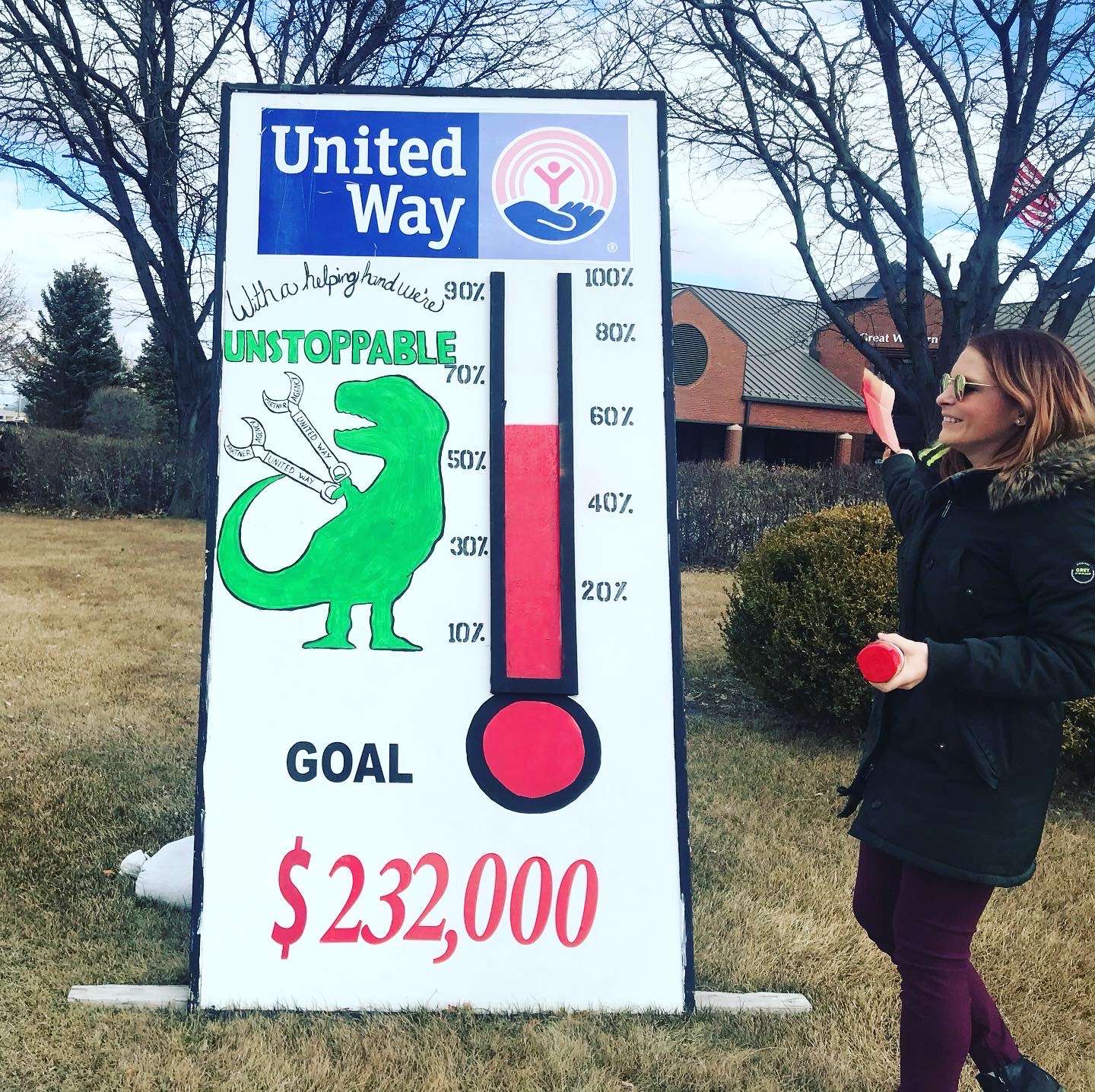 Mid-Plains United Way Executive Director Alisha Forbes updates the goal meter. The agency reports being at 60 percent of the $232,000 goal.