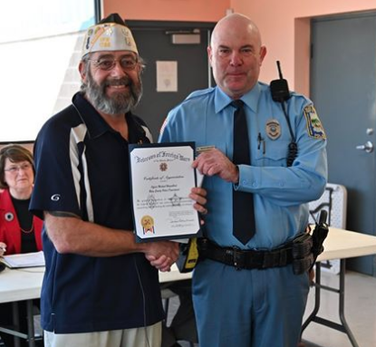 Officer Michael Wagenblast was presented the award at the February Law Board meeting in Ogden -Photo courtesy RCPD