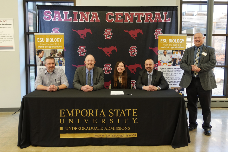<b>Those participating in the signing ceremony include the following Bryce Heitman, family physician at Newman Regional Health and member of Newman Regional Health Physician’s Group, Tim Burnett, chair of ESU’s Biological Sciences Department, Amaya Svenblad, Muhammad Nashatizadeh, neurologist at the University of Kansas Hospital, and Brent Thomas, Dean of ESU’s College of Liberal Arts &amp; Sciences.</b> Photo courtesy ESU