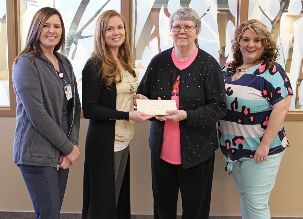 <i><b>Pictured from left are Sara Boyd, EOC committee member; Haley Jones, EOC committee member; June DeWeese, Kids in Crisis of Dickinson County Coordinator; and Cindy Whittington, EOC committee member. </b>Photo courtesy MHS</i>