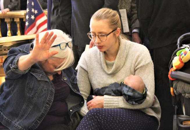  Abortion protestors this year in Topeka, where Medicaid expansion and an anti-abortion amendment to the state constitution have become entagled. Jim McLean / Kansas News Service