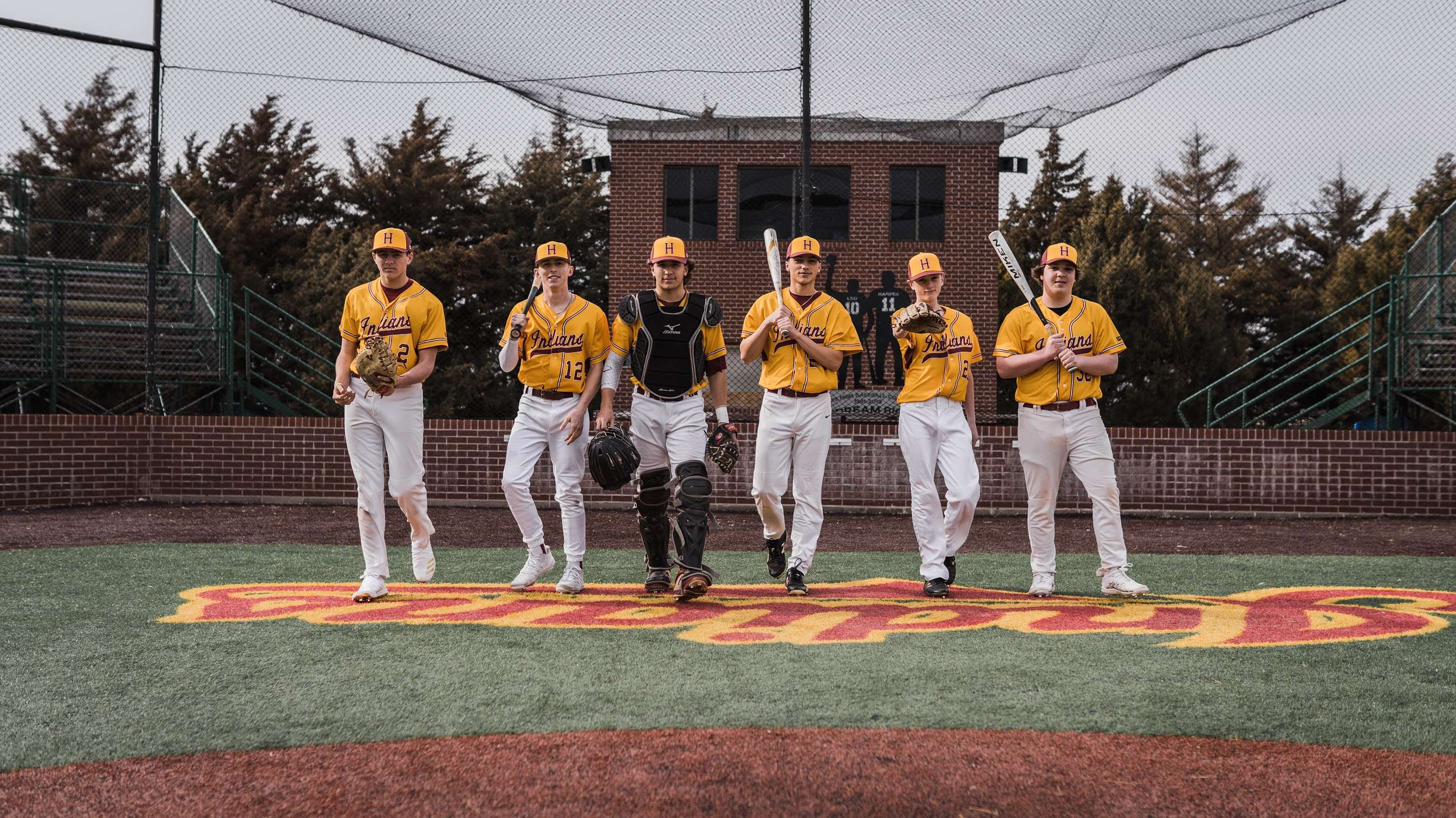 Brock Lummus, catcher, and members of the Hays High baseball team. Lummus expressed disappointment that he will not be able to play his senior season of baseball.&nbsp;