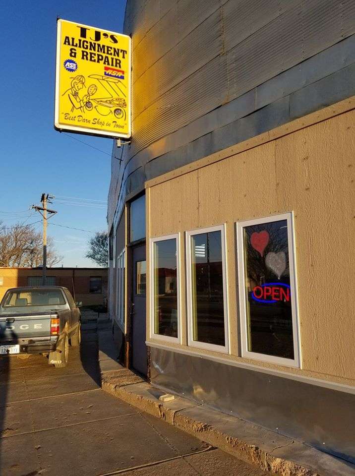 Hearts posted in the window of TJ's Alignment and Repair, WaKeeney, for the Trego Junior High KAY Club scavenger hunt. (Courtesy photo)