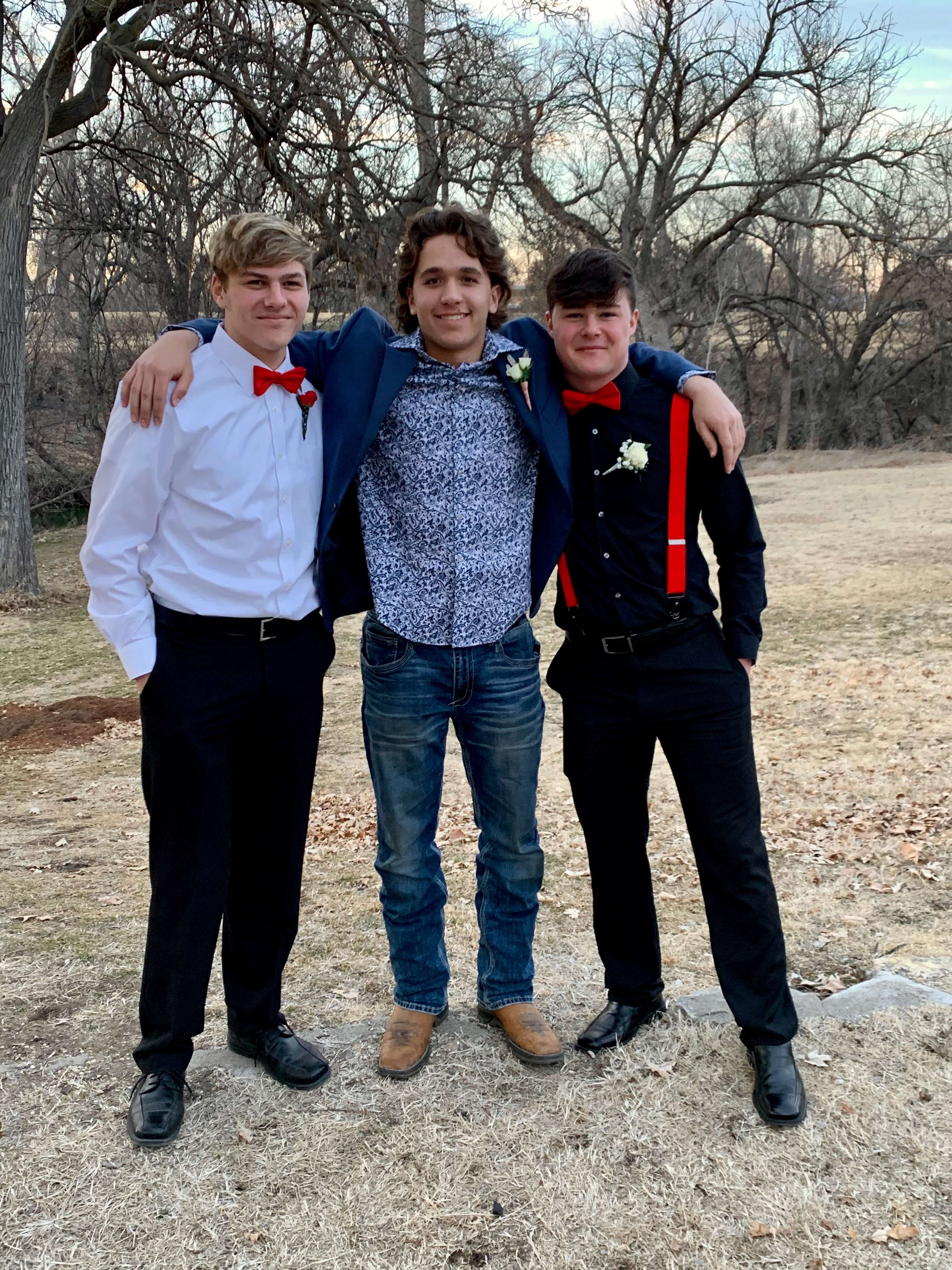 HHS senior Brock Lummus, center, with Josh Haynes, left, and Hayden Brown, right, dressed up for the Indian Call Dance. HHS has tentatively set graduation for Saturday, July 25. Courtesy photo