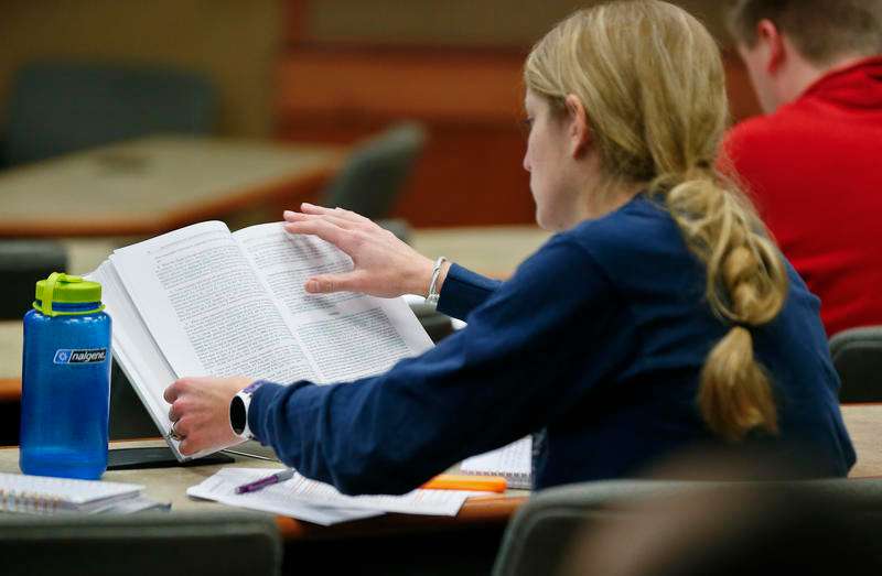A Washburn Law School student searches for an answer during her Labor Law class. Chris Neal / For the Kansas News Service