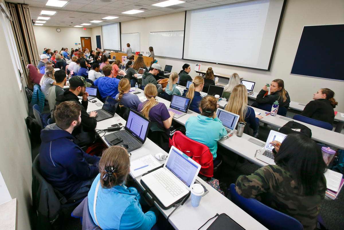 Washburn University nursing school students listen to a lecture by instructors Caren Dick and Belinda Eckert. Credit Chris Neal / For the Kansas News Service