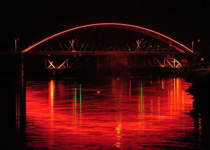 <b>The Amelia Earhart Memorial Bridge in Atchinson lit in orange during a past National Work Zone Awareness Week safety campaign. </b>Photo courtesy KDOT